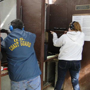 Shooting Man and a woman at the rifle range
